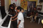 Monica Dogra and Ehsaan Noorani jam with kids of  Akanksha Foundation at the event organised by COLORS Infinity and Furtados School of Music